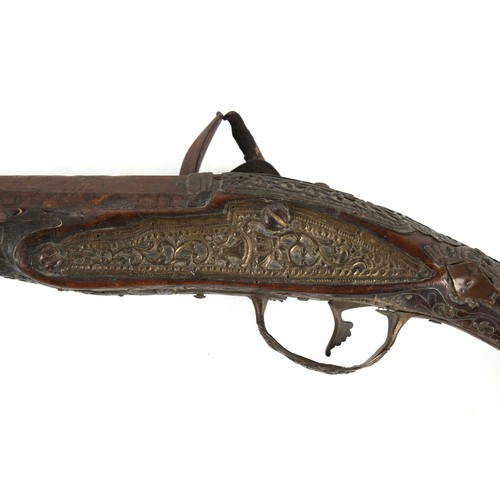 207 - Property of a lady - a large pair of 19th century Turkish flintlock pistols, the white metal mounts ... 