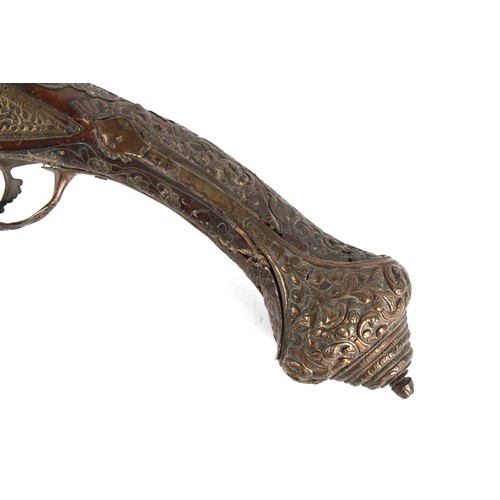 207 - Property of a lady - a large pair of 19th century Turkish flintlock pistols, the white metal mounts ... 