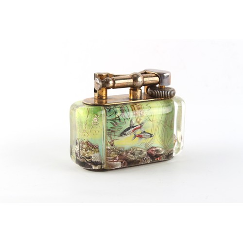 181 - Property of a gentleman - a Dunhill Aquarium table lighter, 3.85ins. (9.8cms.) long.