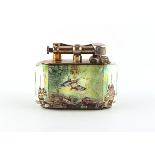 181 - Property of a gentleman - a Dunhill Aquarium table lighter, 3.85ins. (9.8cms.) long.