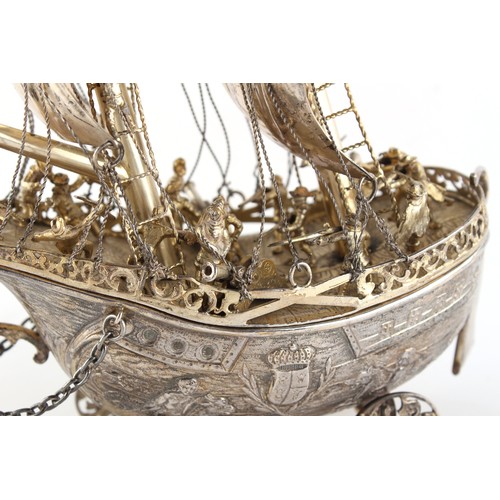 204 - Property of a lady - a late 19th century Continental silver model of a galleon or neff, with crew on... 