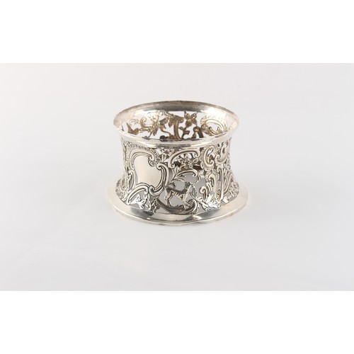 202 - Property of a lady - a late 19th century Irish silver potato ring, with repousse decoration depictin... 