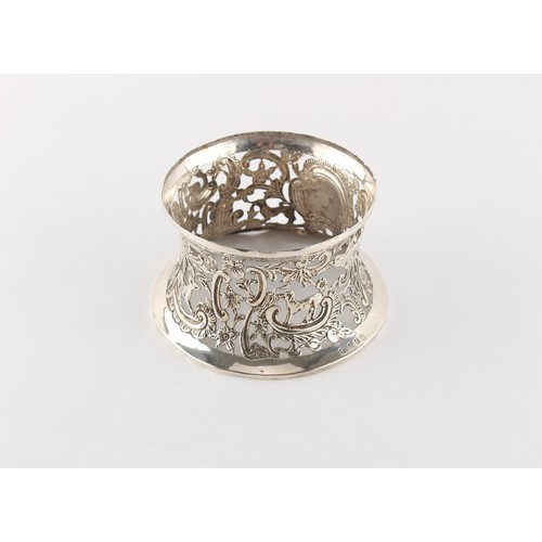 202 - Property of a lady - a late 19th century Irish silver potato ring, with repousse decoration depictin... 