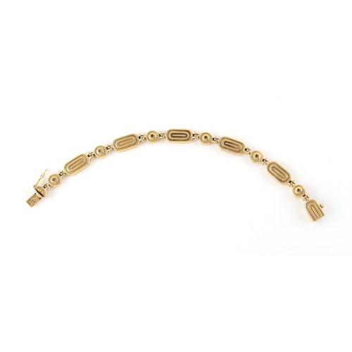 88 - Property of a lady - a modern 18ct yellow gold panel bracelet, 7ins. (18cms.) long, approximately 21... 