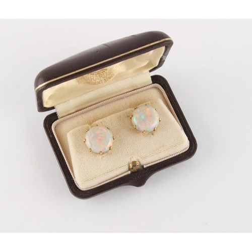 154 - Property of a lady - a pair of 18ct yellow gold opal cabochon button stud earrings, each circular op... 