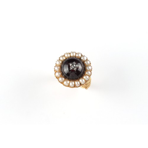 103 - A 19th century yellow gold cabochon garnet & seed pearl circular cluster ring, the cabochon garnet c... 