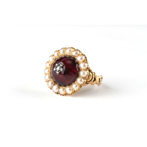 103 - A 19th century yellow gold cabochon garnet & seed pearl circular cluster ring, the cabochon garnet c... 