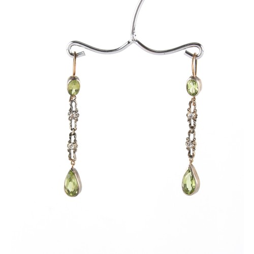 107 - A pair of peridot & diamond drop earrings, each approximately 49mm long (2).