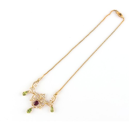 108 - An Edwardian 15ct yellow gold peridot garnet & seed pearl necklace, 15.75ins. (40cms.) long.