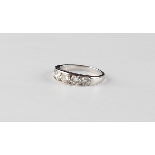 128 - A white gold diamond five stone ring, the five round brilliant cut diamonds weighing a total of appr... 