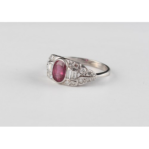 129 - An Art Deco style white gold ruby & diamond ring, the oval cut ruby weighing approximately 1.25 cara... 