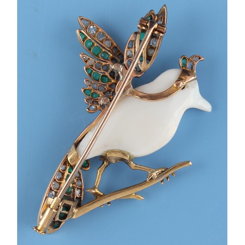 162 - A carved opal emerald & diamond brooch modelled as a bird perched on a branch, in yellow gold settin... 