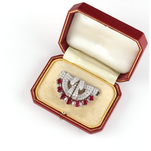 169 - An Art Deco style ruby & diamond double clip brooch, the seven oval cut rubies weighing a total of a... 