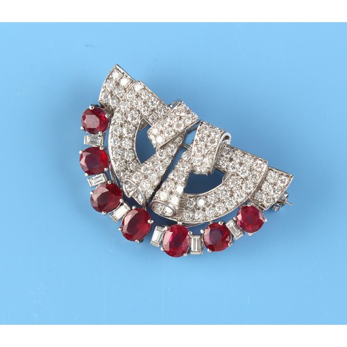 169 - An Art Deco style ruby & diamond double clip brooch, the seven oval cut rubies weighing a total of a... 