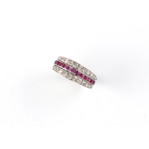 143 - A ruby sapphire & diamond flip ring or swivel ring, with two hinged diamond set half eternity bands ... 