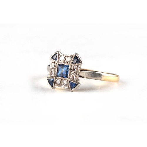 144 - A Belle Epoque style yellow gold & platinum set sapphire & diamond concave square panel ring, with a... 