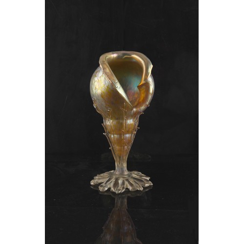 1 - Property of a deceased estate - Loetz - an iridescent glass vase modelled as a conch shell, 11.8ins.... 