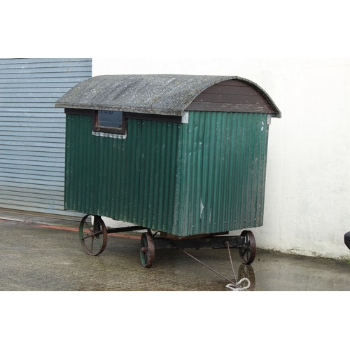 300 - Property of a lady - a half size or child's shepherds hut, 83ins. (210cms.) long excluding towing ba... 