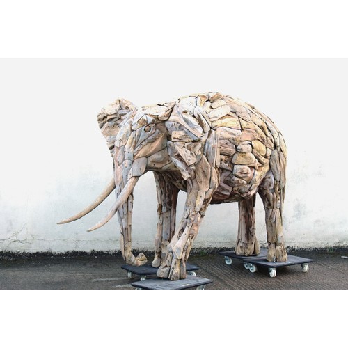 299 - Property of a deceased estate - a monumental driftwood garden sculpture model of an Elephant, approx... 