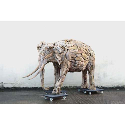 299 - Property of a deceased estate - a monumental driftwood garden sculpture model of an Elephant, approx... 