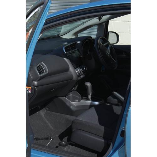 301 - Property of a deceased estate - car - a Honda Jazz, petrol, sky blue, automatic, registration number... 