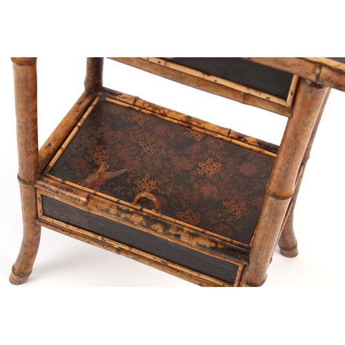 287 - Property of a lady - an Edwardian bamboo & lacquer two-tier work table with frieze drawer & hinged w... 