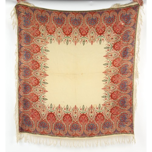 Property of a gentleman - a paisley silk shawl, with plain white centre ...