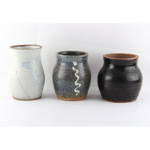 246 - Property of a deceased estate - three studio pottery vases, two with impressed M monogram, the third... 