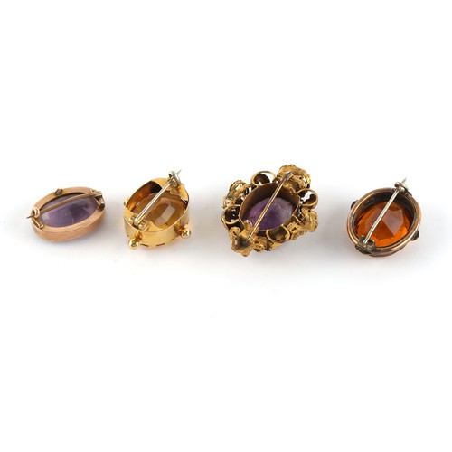 49 - Property of a lady - four various citrine & amethyst brooches (two tested as gold, one as high carat... 