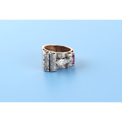 137 - Property of a lady - an 18ct yellow gold mixed cut diamond & ruby buckle ring, approximately 9.6 gra... 