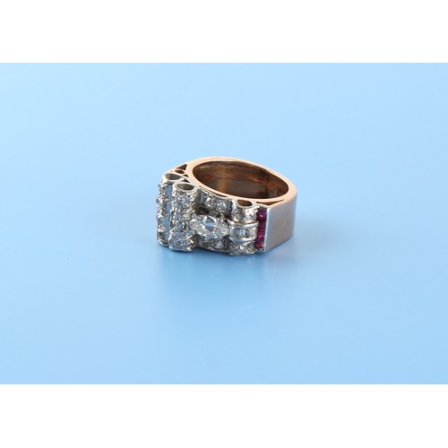 137 - Property of a lady - an 18ct yellow gold mixed cut diamond & ruby buckle ring, approximately 9.6 gra... 