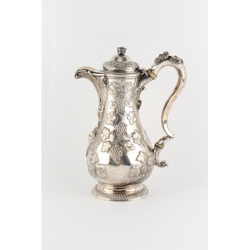 210 - Property of a gentleman - a good quality George III silver baluster hot water or wine jug, unidentif... 