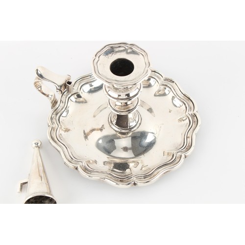 220 - Property of a lady - a mid Victorian silver chamberstick, with snuffer, William Moulson, London 1850... 