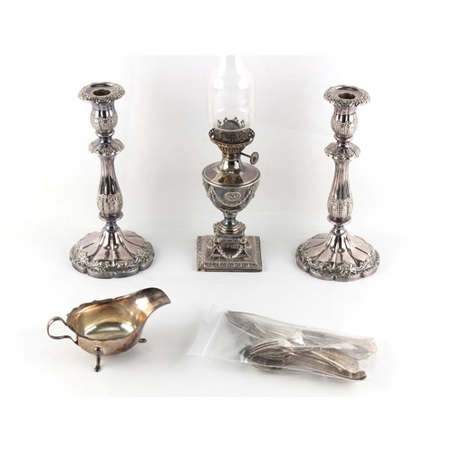 182 - Property of a lady - a pair of early 19th century silver plated candlesticks, 10ins. (25.4cms.) high... 