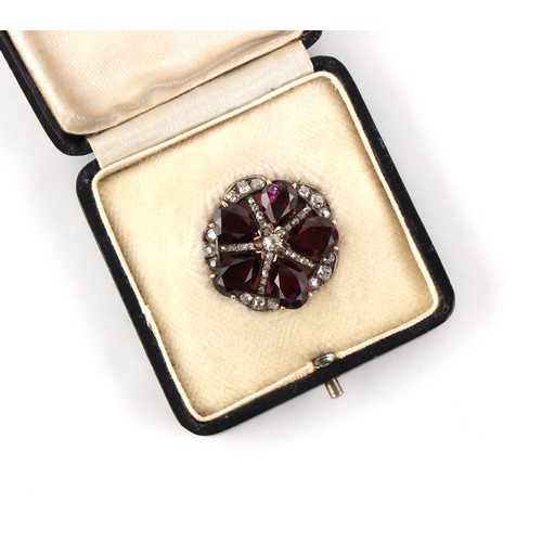 116 - A 19th century garnet & diamond flowerhead brooch, with five pear shaped cut garnets, 28mm across, i... 