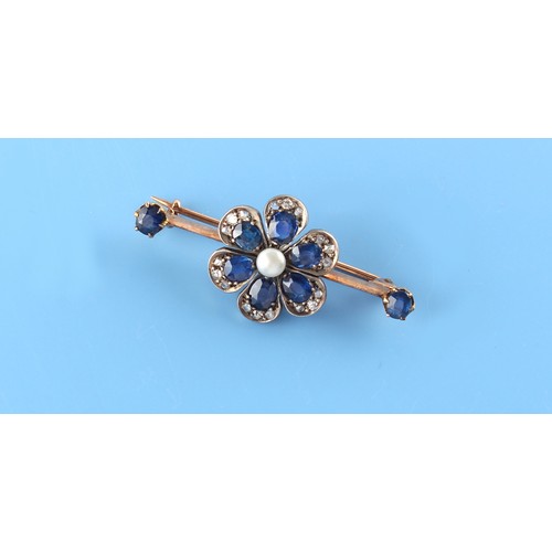 113 - An early 20th century unmarked yellow gold sapphire diamond & seed pearl flowerhead bar brooch, with... 