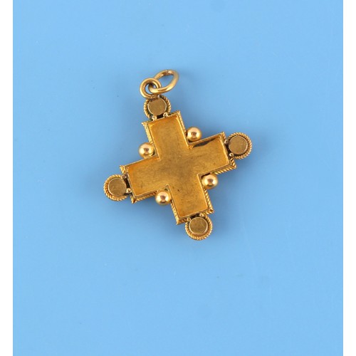 77 - A Victorian Renaissance Revival unmarked yellow gold (tests 18ct) ruby & seed pearl cross pendant, a... 