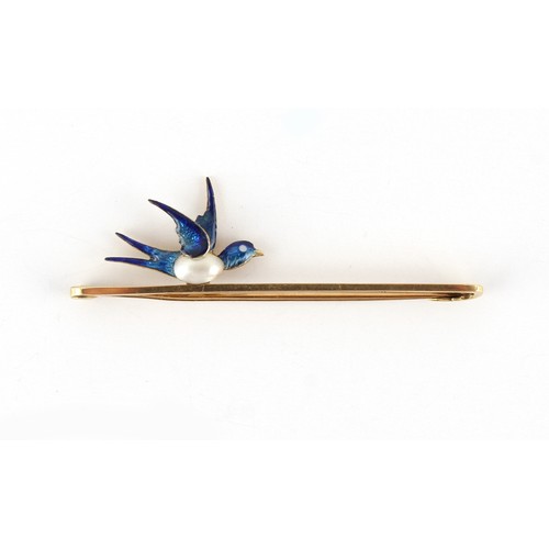 89 - An early 20th century 15ct gold blue enamel & split pearl swallow or swift bar brooch, 51mm long.