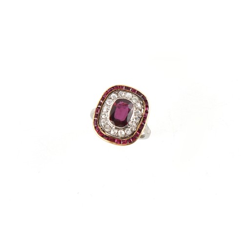 129 - A large ruby & diamond rounded rectangular panel ring, the large certificated Thai or Cambodian unhe... 