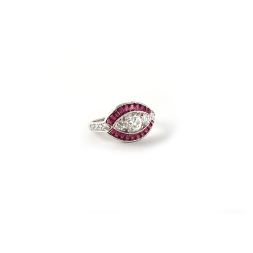 127 - An unmarked white gold ruby & diamond eye ring, with centre Old European cut diamond flanked by furt... 