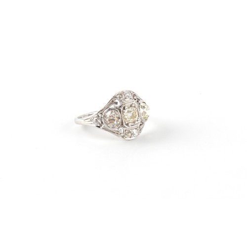 126 - An unmarked white gold diamond ring, the round and oval mixed old cut diamonds weighing an estimated... 