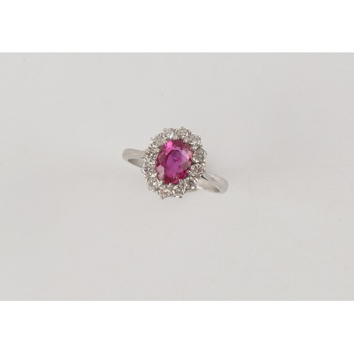 130 - A certificated unheated Burmese (Myanmar) ruby & diamond oval cluster ring, the oval cushion cut rub... 