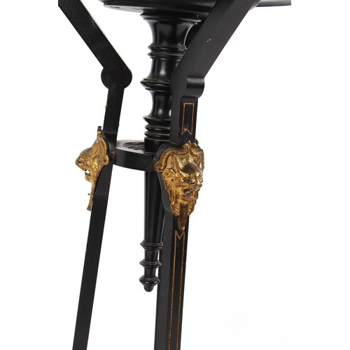 399 - Property of a deceased estate - a Victorian ormolu or gilt brass mounted ebonised torchere or plant ... 