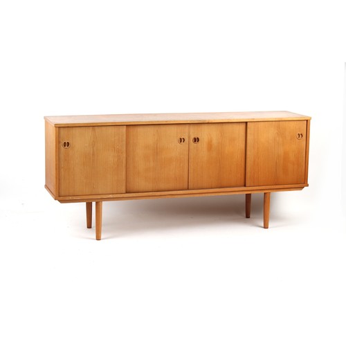 415 - Property of a deceased estate - a teak sideboard, 70.75ins. (180cms.) long; together with a teak occ... 