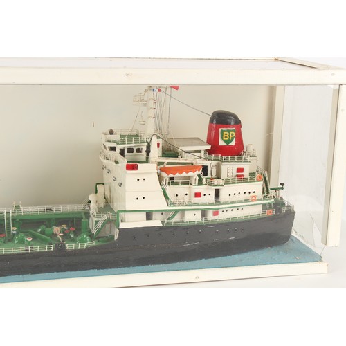 235 - A model tanker or freight ship, in perspex case, one perspex end panel broken, 72.25ins. (183.5cms.)... 