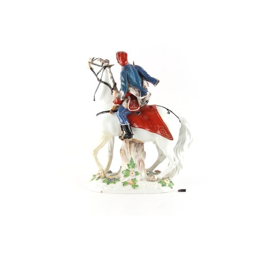 22 - Property of a lady - a Meissen model of a Hussar on grey horse, incised model number 1132, blue cros... 