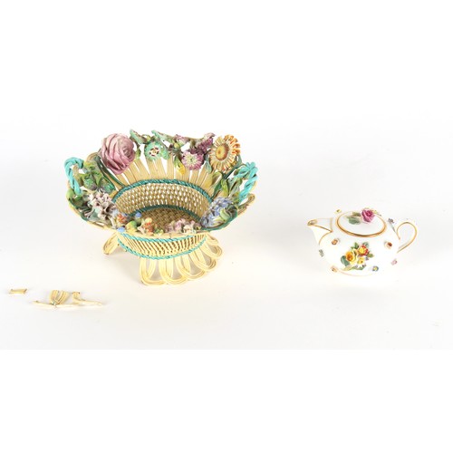 29 - Property of a lady - a small Meissen floral encrusted teapot, blue crossed swords mark, 3.85ins. (9.... 