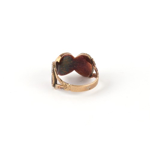 163 - Property of a lady - a Georgian unmarked gold garnet three stone ring, the garnets approximately 9 x... 