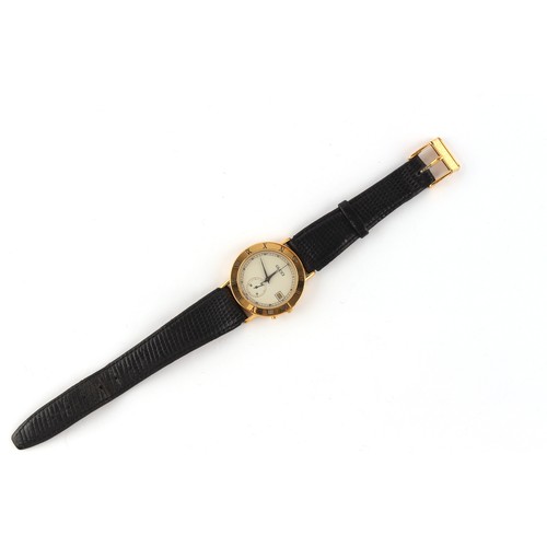 23 - Property of a gentleman - a gentleman's Gucci gold plated quartz wristwatch, with date aperture & su... 