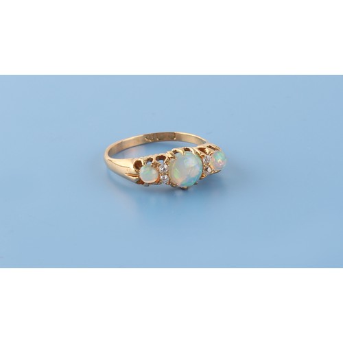 154 - An early 20th century 18ct yellow gold opal & diamond ring, the three round opals alternating with t... 